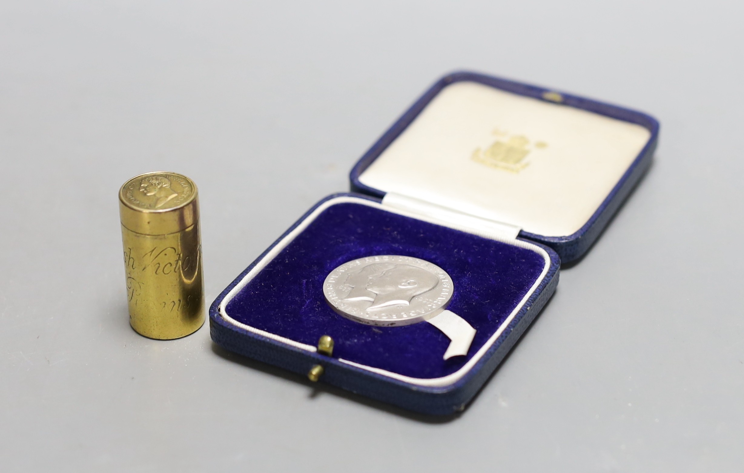 Marquis of Wellington’ British Victories in the Peninsular Campaign cylindrical brass box by Thomason & Jones, containing 23 gilt medallions, together with a cased silver commemorative medallion